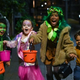 Kids trick-or-treating in costume